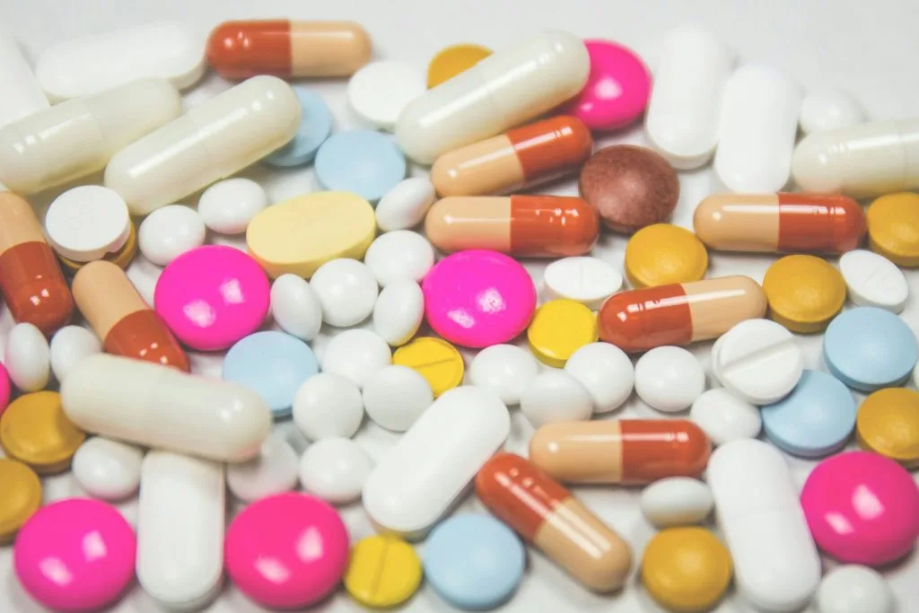 Colorful assortment of pills and capsules, symbolizing Poland’s growing pharmaceutical manufacturing industry and local medicine production.